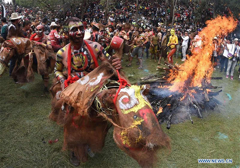 Men of Yi ethnic group ride dummy horses beside a bonfire during the annual fire worshipping festival, which falls on the third day of the second month in the Chinese lunar calendar at Xiyi Township under Mile City, southwest China's Yunnan Province, March 11, 2016. (Xinhua/Lin Yiguang) Men of Yi ethnic group ride dummy horses beside a bonfire during the annual fire worshipping festival, which falls on the third day of the second month in the Chinese lunar calendar at Xiyi Township under Mile City, southwest China